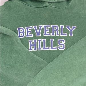 Beverly Hills pace in hoodie
